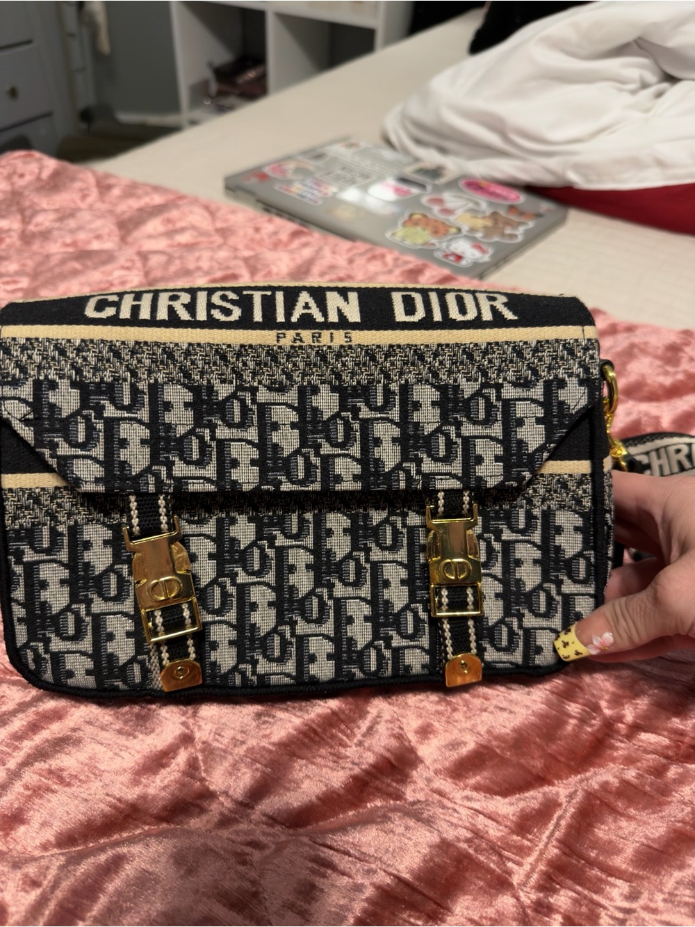 Black and Cream Logo Saddle Crossbody Bag with Gold Hardware